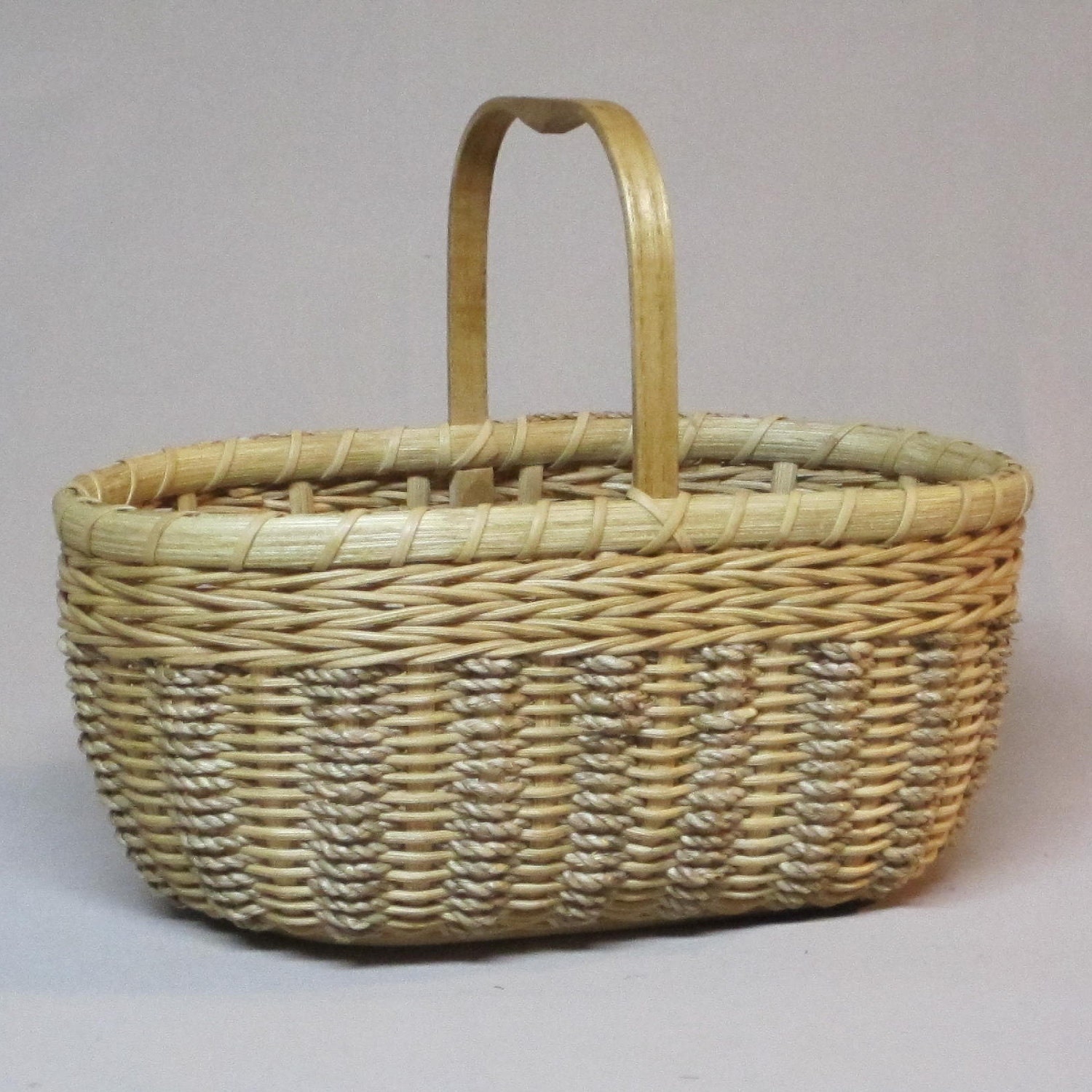 Hand Woven Oval Basket with Wooden Base and Handle Decorative