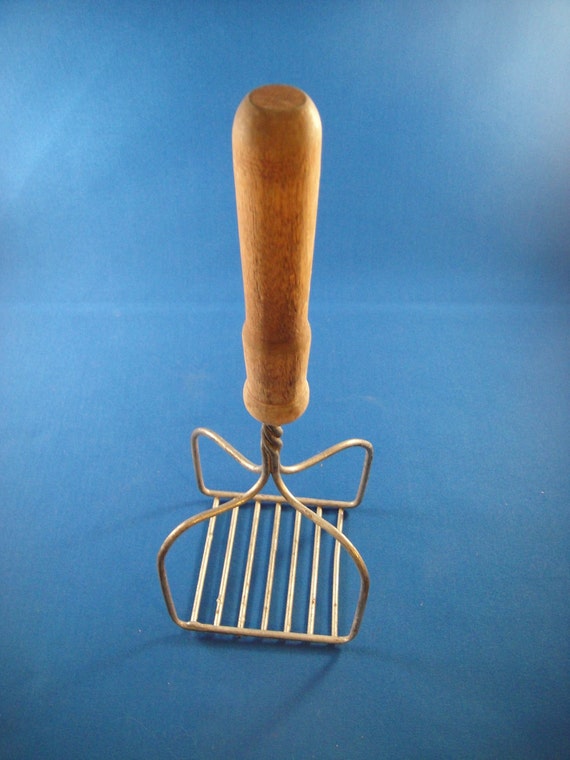 Vintage Potato Masher with Wooden Handle by WishingWellsGlass