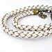 Double wrap white and brown braided leather bracelet with brass lobster clasp