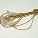 Signed R.Mandle Mother Of Pearl Rhinestone Mandolin Brooch