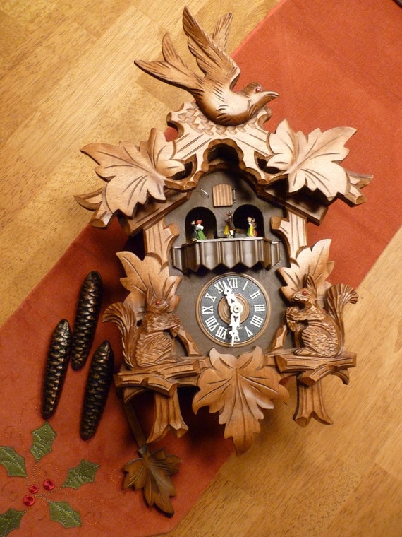 Vintage Cuckoo Clock with Music/Dancers Black ForestSQUIRRELS