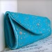 Teal blue clutch purse with flowers. Spring fashion. Casual Clutch bag.