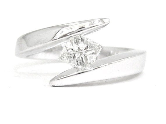 Tension princess cut engagement rings