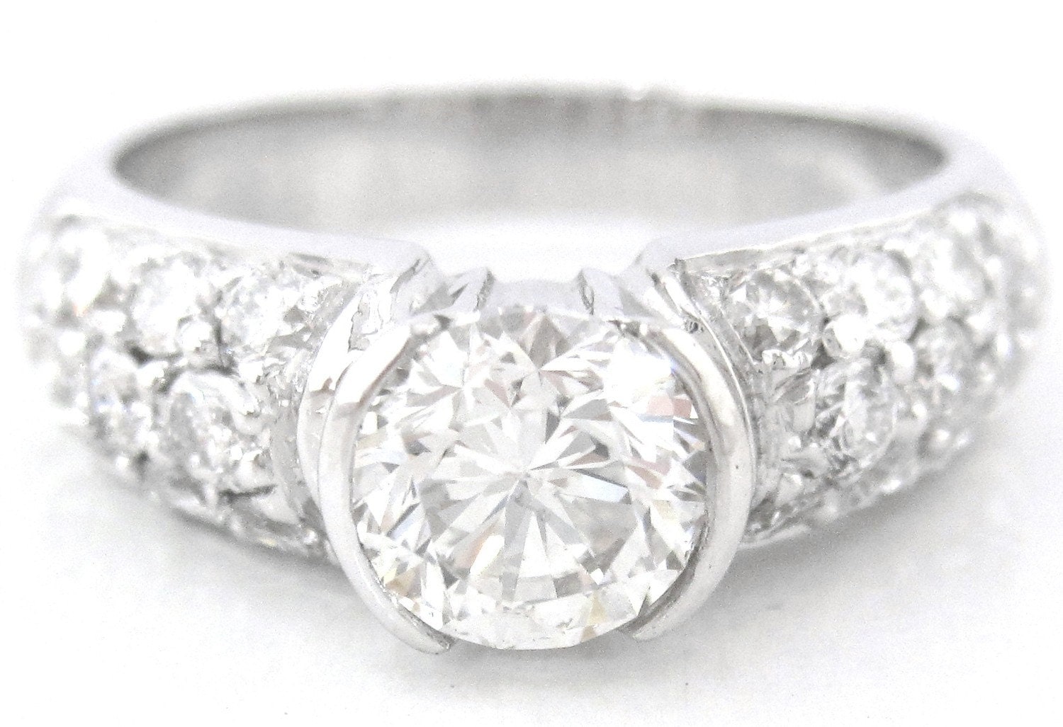 Round diamond engagement ring semi bezel and pave set by KNRINC