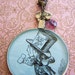 Mad Hatter optical lens necklace