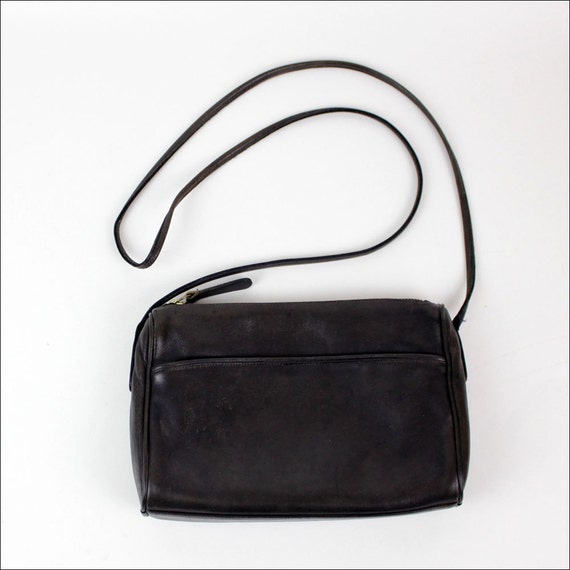 Coach black leather sling bag / long strap cross body bag