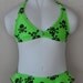 Girl swimsuit lime green skulls and cross bones with hearts bikini
