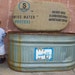 Storage Bench from Salvaged Water trough covered in reclaimed coffee sacks