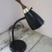 industrial gooseneck desk lamp powdercoated black steel teak and gold accents mid century over 14 inches high