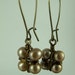 Dangle Earrings, Four Champagne Pearls, Wire Wrapped like a Bundle, Japanese Style, Kidney Earwires, Brass