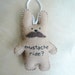bunny with mustache stuffed animal