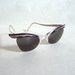 1950s Blue & gold engraved cat eye sunglasses, with case
