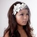 Diamond white orchid birdcage veil fascinator