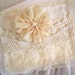 beautiful card made from antique laces, vintage silk rosette, and pearl
