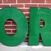 big ole green sign letter O
