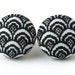 Black stud earrings white feathers