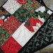 Holly and pinecones table runner