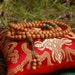 Sandalwood mala with turquoise spacers for meditation