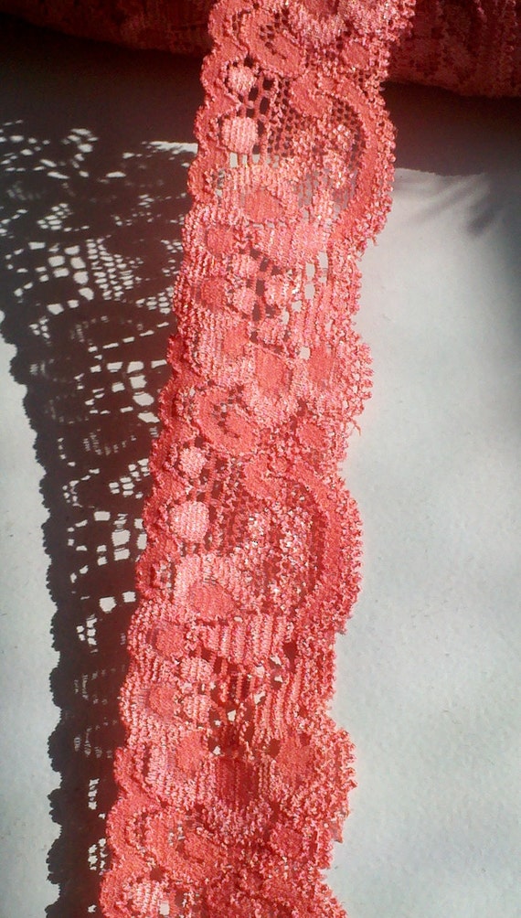 Beautiful 1 1/4 Stretch Coral Color Lace. Great for