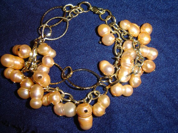 Items similar to Peach Colored Clusters of Freshwater Cultured Pearls