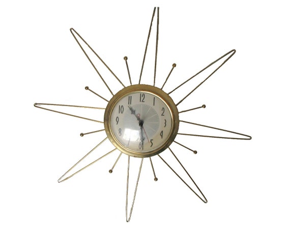 Starburst Clock 60s by TheVintageDesignShop on Etsy