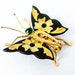 SALE Damascene butterfly bug brooch with faux emerald paste ,early 20th century