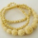 Carved ivory or bone bead graduated necklace, antique