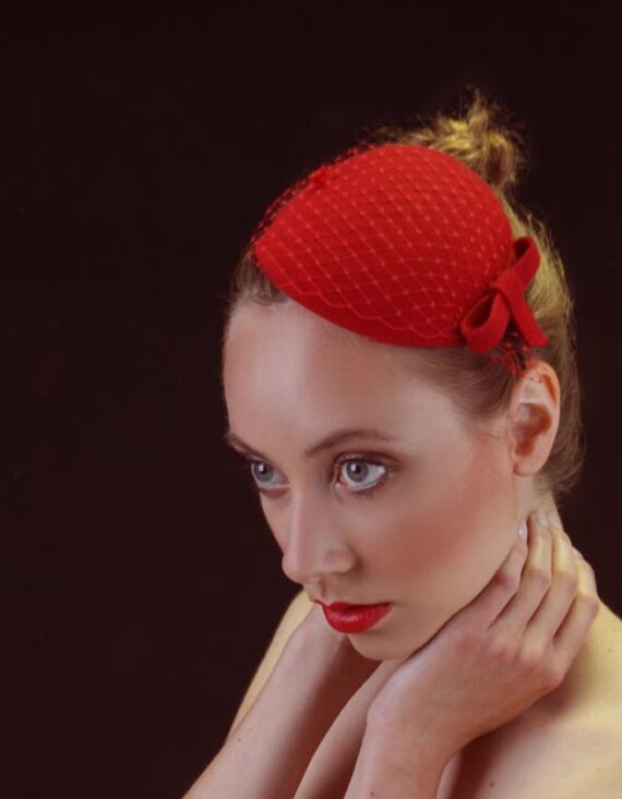 Items similar to Red Fascinator with Veil and Bow on Etsy