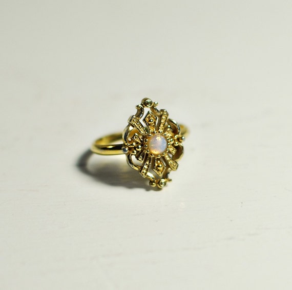 Vintage Avon Gold Ring with Opal Gem Center by orangetwine on Etsy