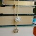 Shh I'm Writing book lover's typewriter, golden heart, and vintage paper & pearl necklace