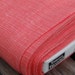 LAST YARD Screen Texture in Coral from Timeless Treasures