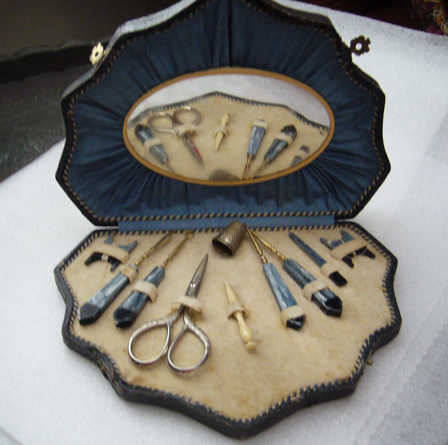 Victorian sewing set / box with celluloid tools