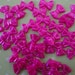 Magenta pearlized bow flatbacks 30 pcs
