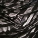 REMNANT--Silver on Black Animal Pattern Polyester Jersey Fabric--1 & 2/3 Yards