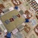 Oh Boy baby quilt in modern brown, green and blue