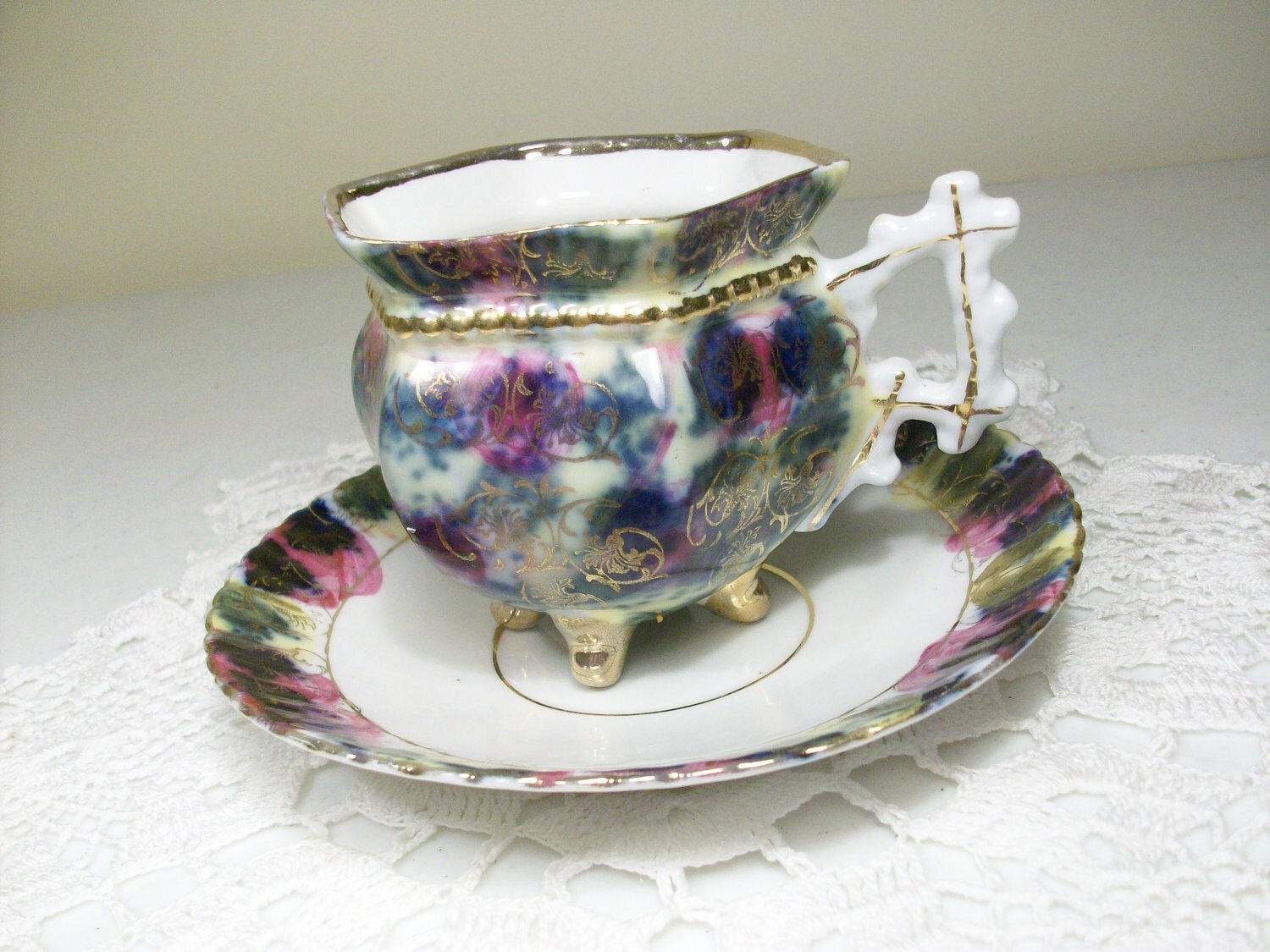 4 Footed Tea Cup & Saucer // by AJewelsQuest on Etsy