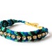 Rhinestone friendship bracelet in green/blue