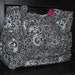 black and gray diaper bag