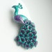 Polymer clay peacock brooch pin in turquoise, purple and pink handmade