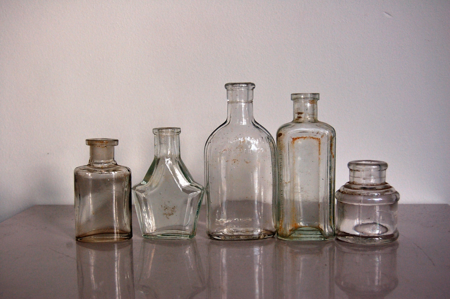 small-clear-glass-bottles-vintage-british-household-bottles