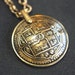 Rich Antiqued Gold Yantra Pendant Necklace