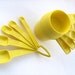 RESERVED FOR ALISA Tupperware measuring cups and spoons sunny yellow