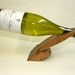 Wine Bottle Stand - Self Balancing Wine Bottle Holder of 100-year-old Red Oak