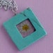 real pressed flower turquoise resin pendant