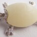 Vintage jewelry brooch by Hattie Carnege silvertone with rihnestones turtle brooch with faux ivory shell