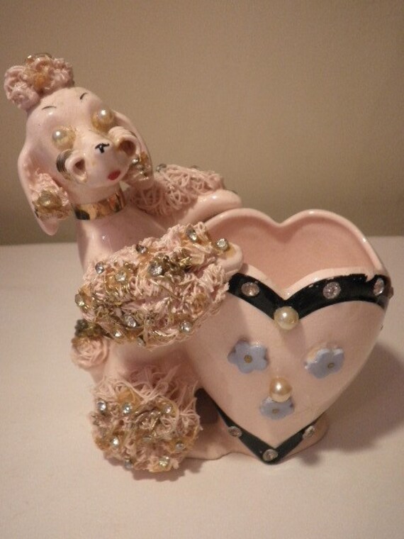 pink spaghetti poodle figurine
