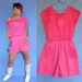 1980s Jumper Romper in Pink with Sea Shell motif and Pockets size Medium