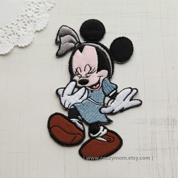 quilted minnie with metal logo
