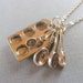 Bakers Necklace with muffin pan and measuring spoons