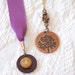 Bookmark featuring Bronze Tree Pendant and Sun Charms